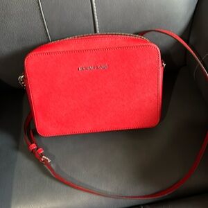 Michael Kors red handbag